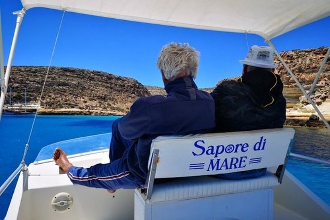 7 hours Boat trip to Lampedusa lunch, SUP and Snorkeling - A 7-hour Lampedusa boat day built for swimming and shade breaks
