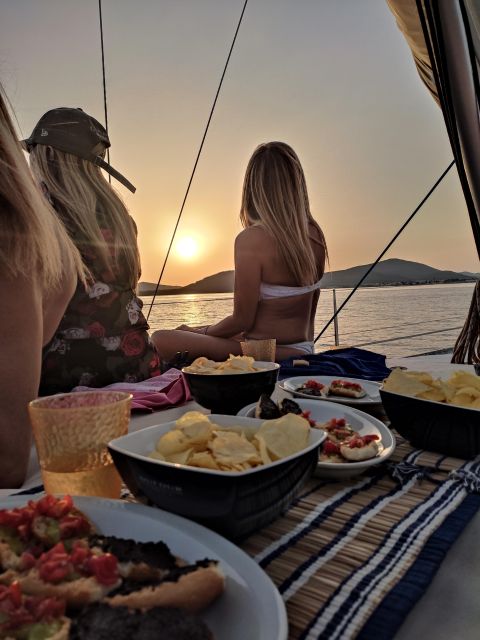Alghero: Sunset Sailing Aperitif Experience - Sailing Out from Alghero Bay: The Part Before the Swim