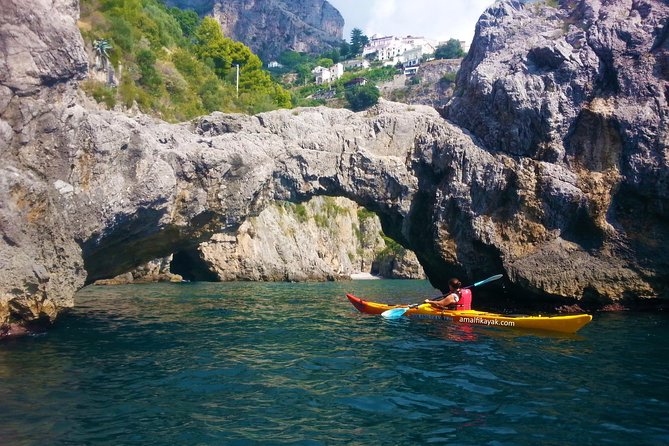 Amalfi Coast Kayak Tour: Explore Caves, Arches & Hidden Beaches - Conca dei Marini paddle scenes, plus the Santa Rosa Monastery view