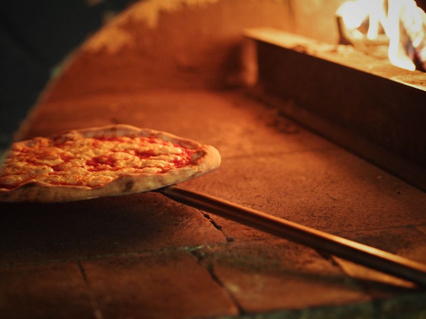 Authentic Neapolitan Pizza Lesson - The wood-fired oven bake: where the dough turns into a real Neapolitan pizza
