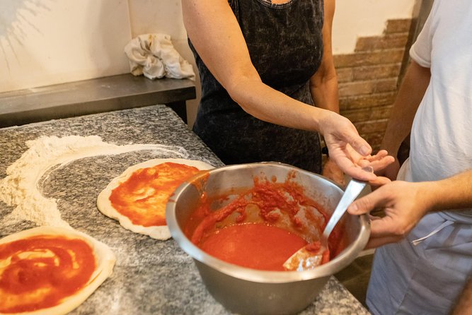 Authentic Pizza Making Class in Naples with Appetizers and Drink - Appetizers first: fior di latte, bruschetta, and cherry tomatoes