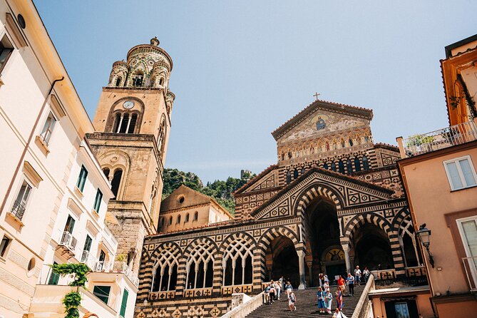 Boat-Hopping On The Amalfi Coast & Positano: Day Trip from Rome - Ferry cruising the Amalfi Coast toward Positano