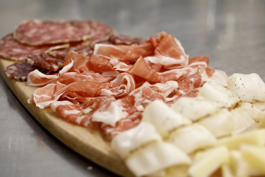Bologna: Food and Wine Tasting with Interactive Game - Food Valley plates with prosciutto, mortadella, Parmigiano, balsamic, and oil