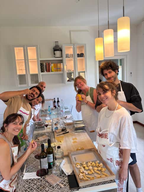 Bologna: In-Home Italian Pasta Making Workshop with Wine - A Bologna living room, candlelight, and Fred’s welcoming pacing