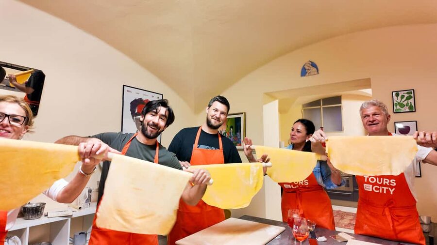 Bologna: Pasta Tagliatelle Ragu Cooking Class with Spritz - Mortadella aperitif, herbs, and the spritz setup before you cook