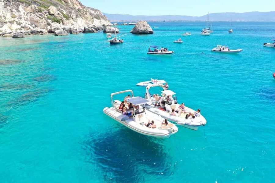 Cagliari: Boat Tour, 4 Stops, Swim, Snorkeling, & 1 Spritz - Skipper Energy: Legends, Bluetooth Music, and a Real Group Vibe