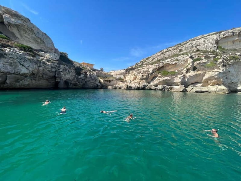 Cagliari: Boat Tour with 4 Swim Stops, Snorkeling & Prosecco - Meeting point and timing: the 20-minute rule is real