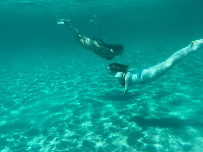 Cagliari: Boat Tour with 4 Swim Stops, Snorkeling & Prosecco - Snorkeling gear and sea life: what to expect under the surface
