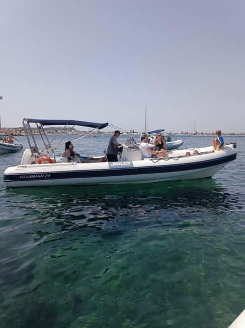 Cagliari: Devil's saddle boat tour, 4 stops and prosecco - What’s onboard during the tour: skipper, bilingual guide, gear, shower, and music