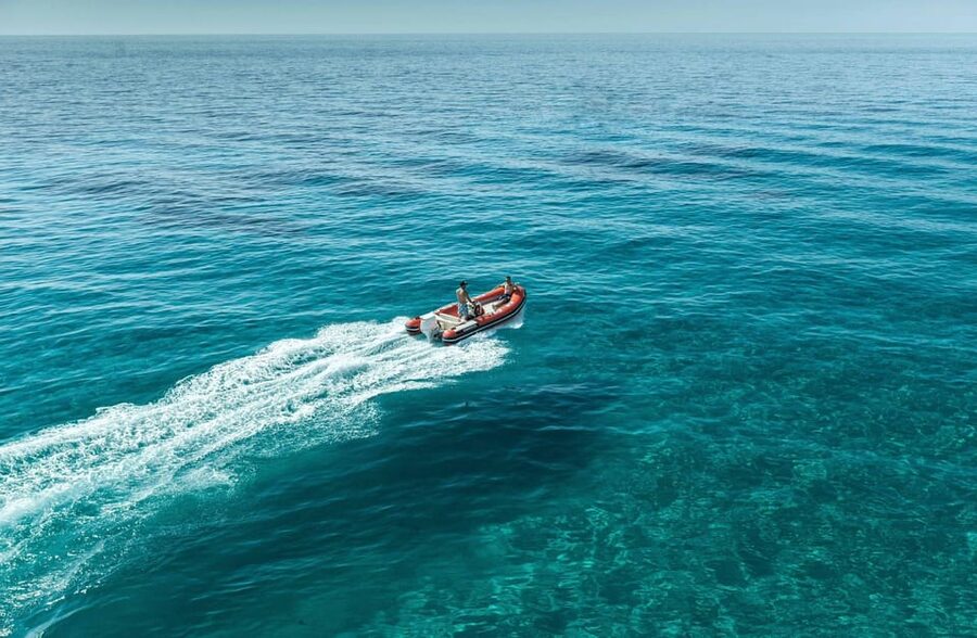 Cagliari: Devil's Saddle Boat Tour with Spritz and Chips - Crew energy, language, and the “make it work” skill