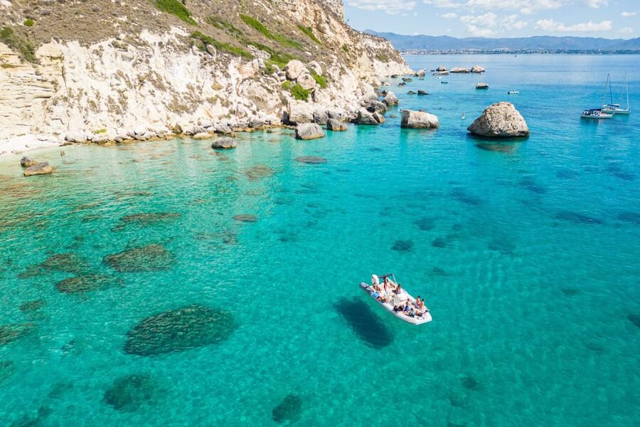 Cagliari: Zodiac Boat Tour, 3-4 SwimStops, Wine & Snorkeling - Cala Fighera: photo stop energy with extra water time