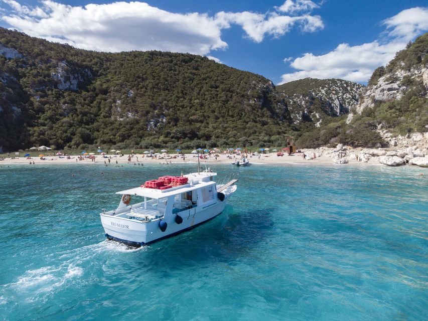 Cala Gonone: Guided Boat Tour to Cala Luna Beach - Cala Luna Beach Time, Sand, Caves, and the Oleander Forest