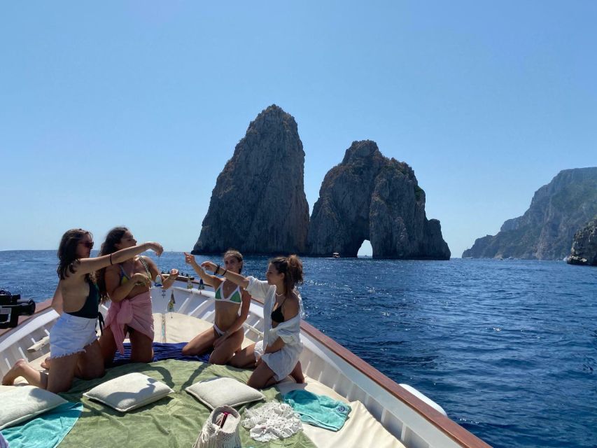 Capri: Island and Grottos Boat Cruise with Snacks and Drinks - Casa Malaparte and Punta Carena Lighthouse, the Capri icons from sea level