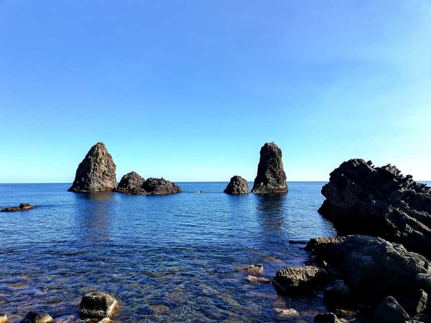 Catania: Cyclops Coast Cruise with Appetizer & Snorkeling - Cyclopean Isles and the snorkeling hour near Aci Trezza