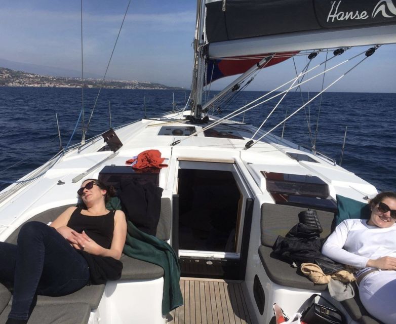 Catania: Spritz and Sunset Sailing Tour - The Aci Trezza aperitif hour: where the drinks actually feel local