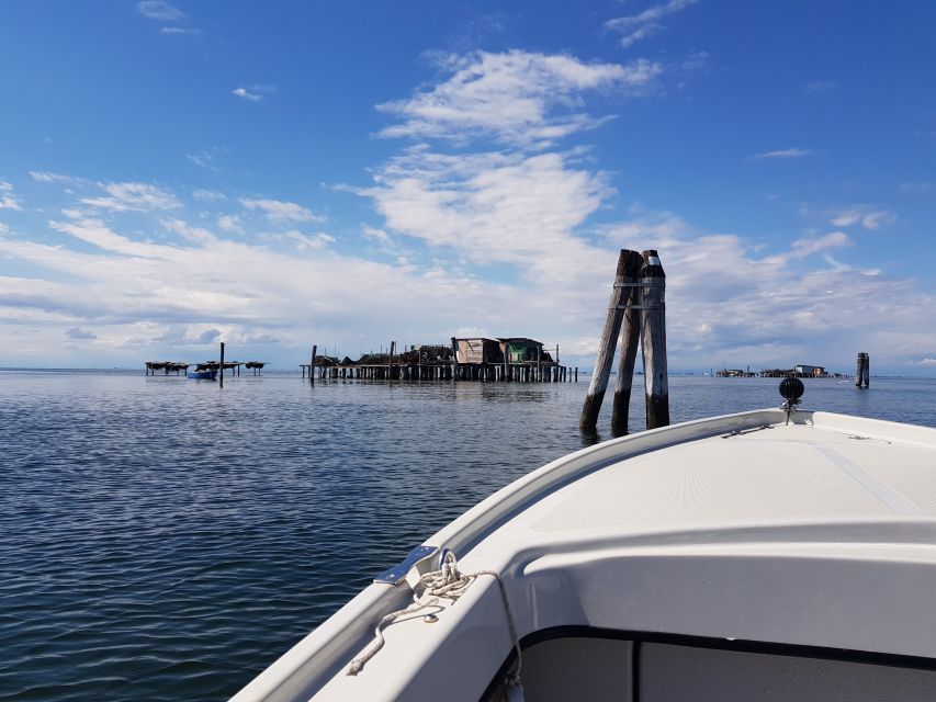 Chioggia: Venetian Lagoon and Canals Boat Tour - The Topa boat and the low-bridge advantage