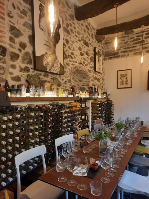 Cinque Terre: Pesto Making Class with Wine and Food Tasting - Finding Your Way: Vernazza Train Station to a Stone Building