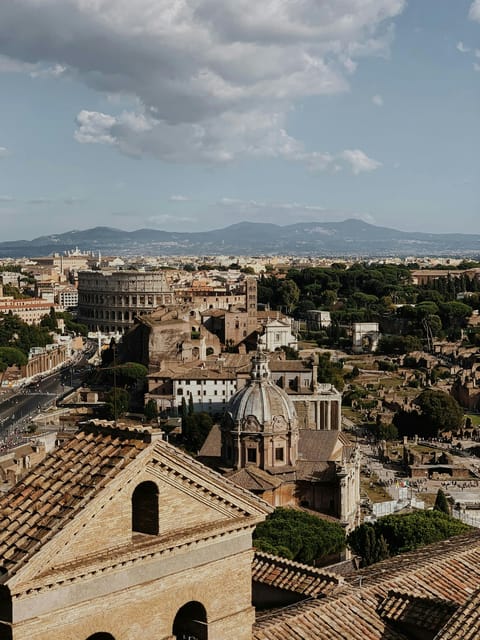Colosseum Entry with digital audioguide and arena option - Standing inside the Colosseum complex: your self-paced “story route”