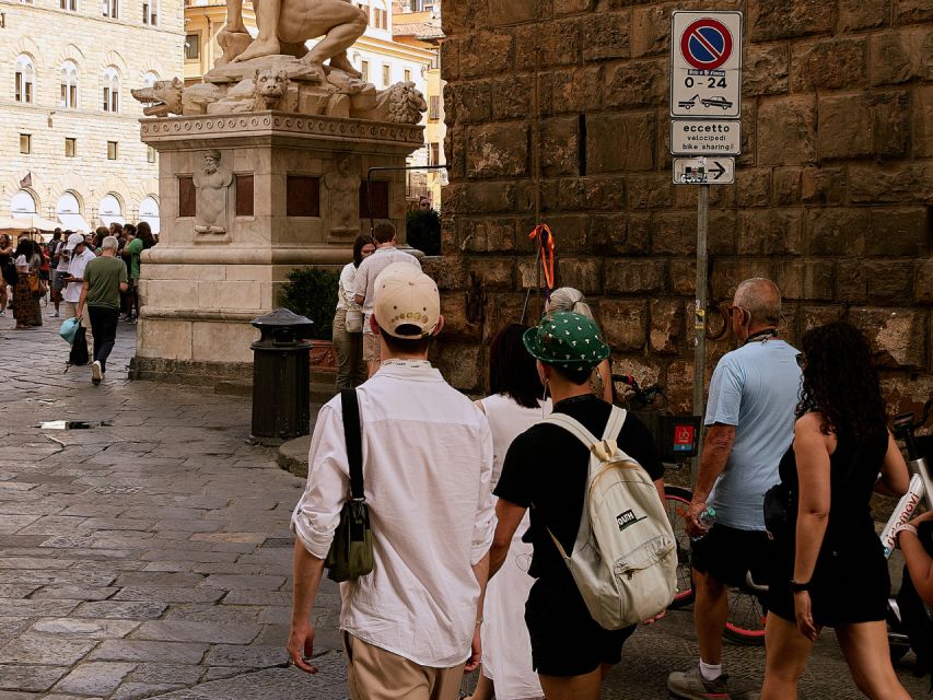 Florence: City Highlights Walking Tour + Wine Windows Option - Group feel, earphones, and pacing on narrow streets