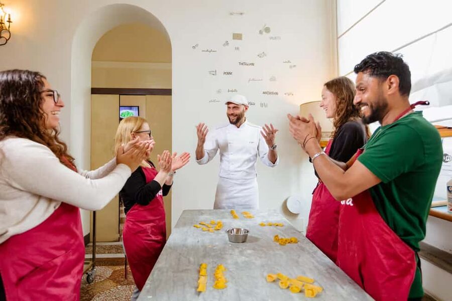 Florence: Pasta Class with Wine, Limoncello and Dessert - Entering a Florence Palace Kitchen by Ponte Vecchio