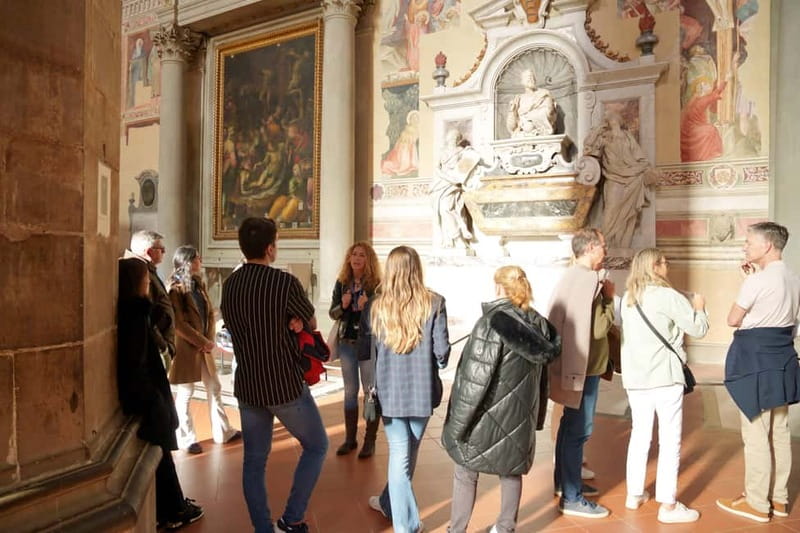 Florence: Santa Croce Church Tour with Entry Ticket - The cemetery, the 1966 flood, and restored damage you can actually see
