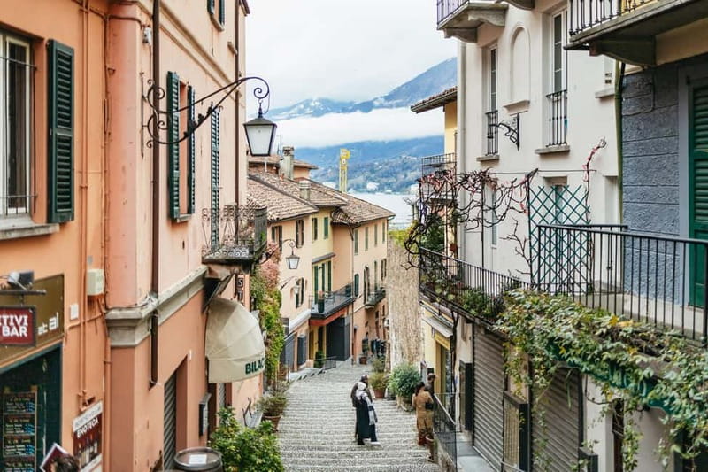 From Milan: Lake Como & Bellagio DayTour with Private Cruise - Ferries to Bellagio: colorful views, crowded seating