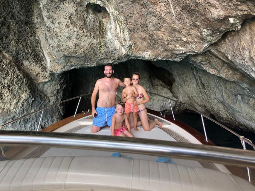 From Naples: Boat Tour to Capri Island with Aperitiv - Capri Coastline, Sea Caves, and the Faraglioni Photo Moment