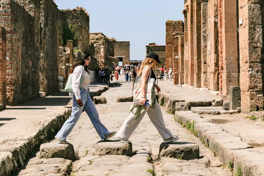 From Naples: Pompeii Skip-the-Line Guided Tour - Baths, street food, and the Lupanare: daily routines at human scale