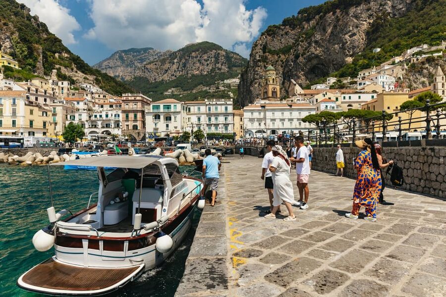 From Naples: Positano and Amalfi Boat Tour with Drinks - Boat tour day: views, skipper skills, and an English-speaking guide