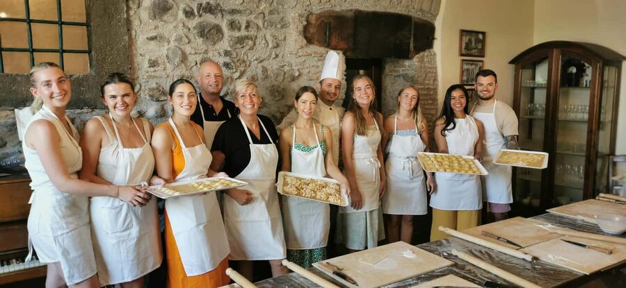 From Rome: Pasta Masterclass & Wine Tour in the Vineyard - The 9th-generation farmhouse pasta lesson, apron on