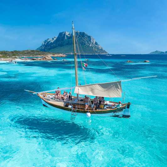 From San Paolo: Tavolara and Molara Island Cruise with Lunch - Prosecco, wine, and lunch on a boat that keeps the day flowing
