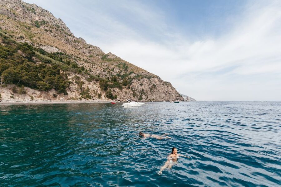 From Sorrento: Amalfi and Positano Full-Day Trip by Boat - Positano stop: domed cathedral photos, pastel houses, and quick photo math