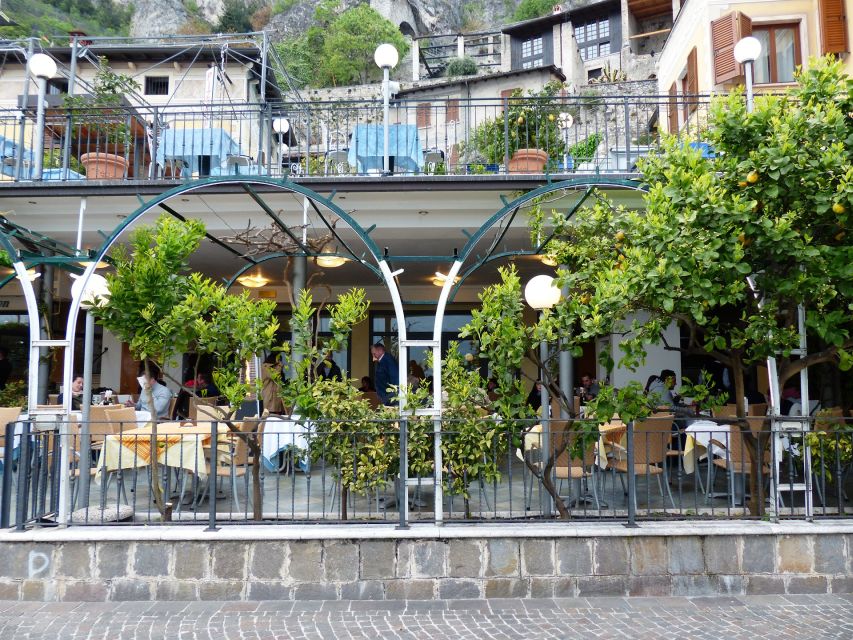 Full-Day Lake Garda Tour: Bus & Public Boat with Guide - Friday route: Sirmione, Limone sul Garda, and Malcesine by boat