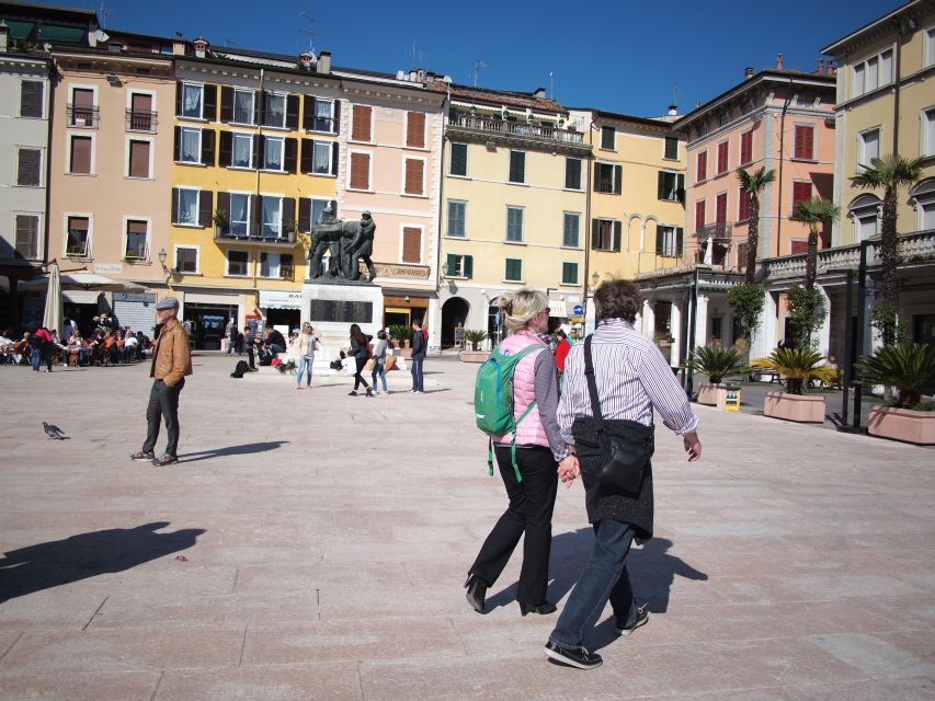 Full-Day Lake Garda Tour: Bus & Public Boat with Guide - Your guide turns stops into a connected story