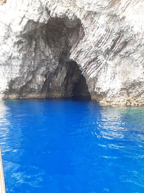 Giardini Naxos: Isola Bella and Grottos Cruise with Aperitif - Blu Grotto and the Bays of Mazzarò and Sirene