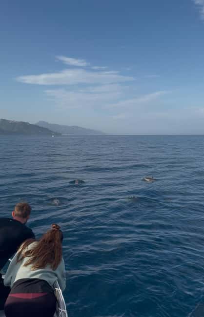 Giardini Naxos: Sunset Dolphin Watching Cruise with Aperitif - Aperitif at sunset: Sicilian bites, pizza, and plenty of Prosecco
