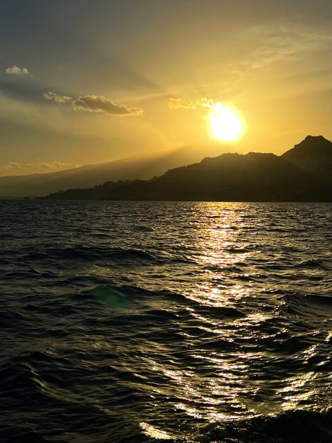 Giardini Naxos Taormina: Dolphin Watching Sunset Tour - Food and Prosecco on board: what to expect when the menu is local snacks