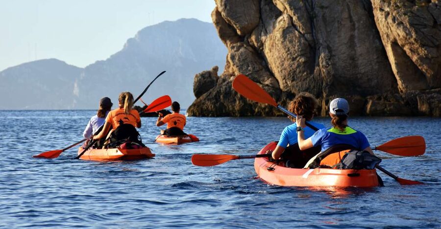 Golfo Aranci: Kayak Tour with Dolphins and Aperitif - Spiaggia dei Baracconi meeting point, and how you start off smoothly