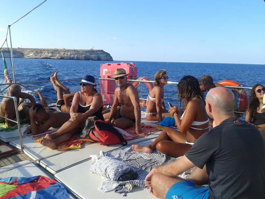 Lampedusa: Yacht excursion, swimming stops and typical lunch - Muro Vecchio on the north coast: sapphire water and cave visits