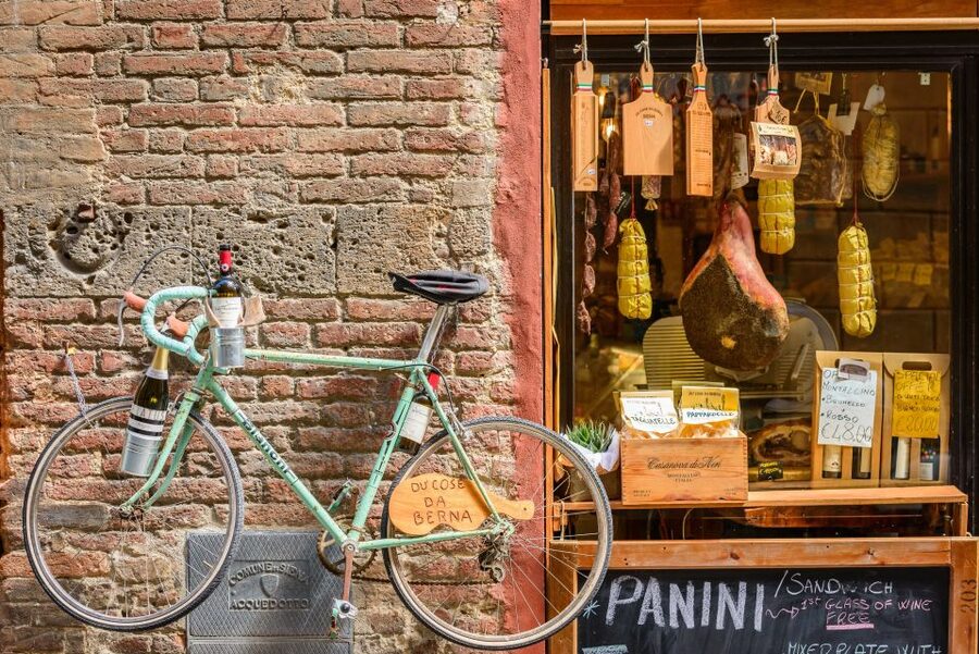 Lucca: Guided Food Walking Tour with Tastings - The First Tasting Stop: Wine and Cheese in a Local Bar