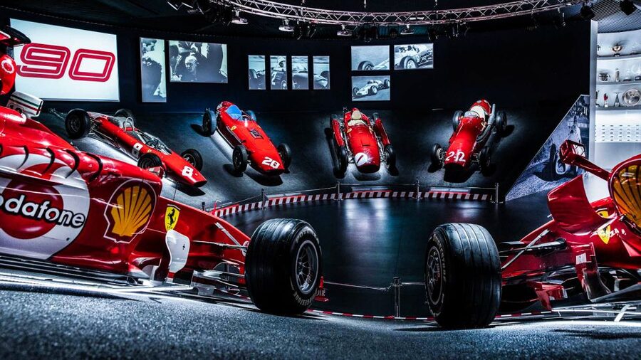 Maranello and Modena: Ferrari Museums Combo Tickets - Inside Modena: Enzo Ferrari, Sectored Engine Exhibits, and Rotating Film