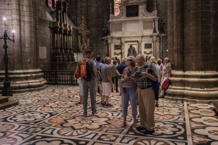 Milan Duomo and Rooftop 2-Hour Guided Tour - Inside the Duomo: stained glass, the Holy Nail, and zodiac symbolism