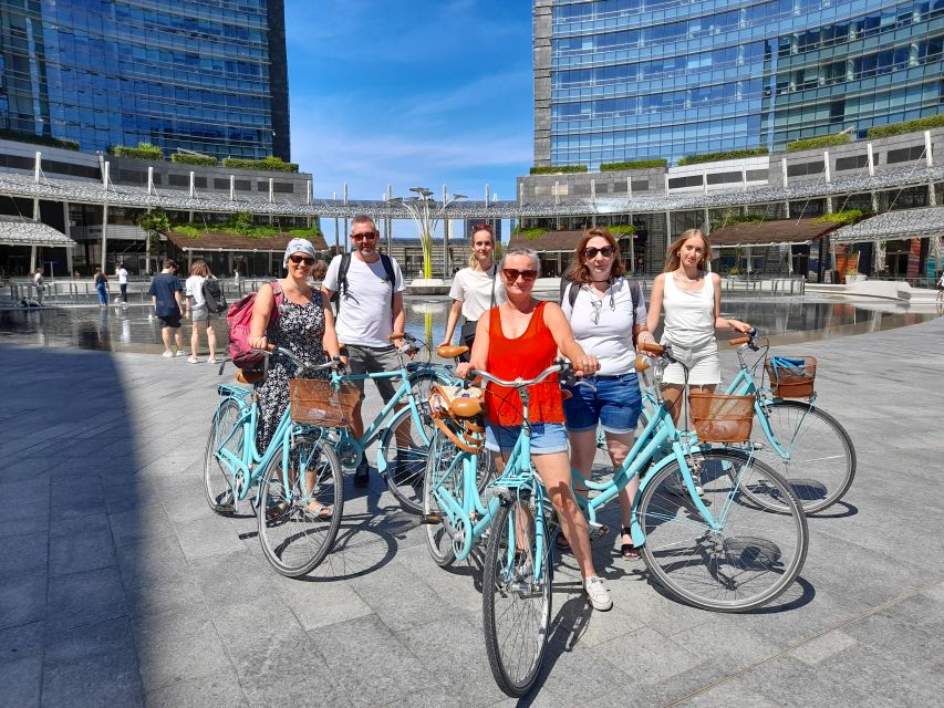 Milan: Highlights and Hidden Gems Guided Bike Tour - How the bikes, helmets, and weather jacket change the experience