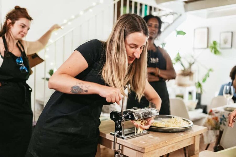 Milan: Pasta & Tiramisu Cooking Class with Premium Products - Your family-style meal and the wine that makes it feel like dinner