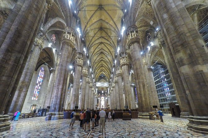Milan Super Saver: Skip-the-Line Duomo and Rooftop Guided Tour - Inside the Cathedral: What the Guide Helps You Notice