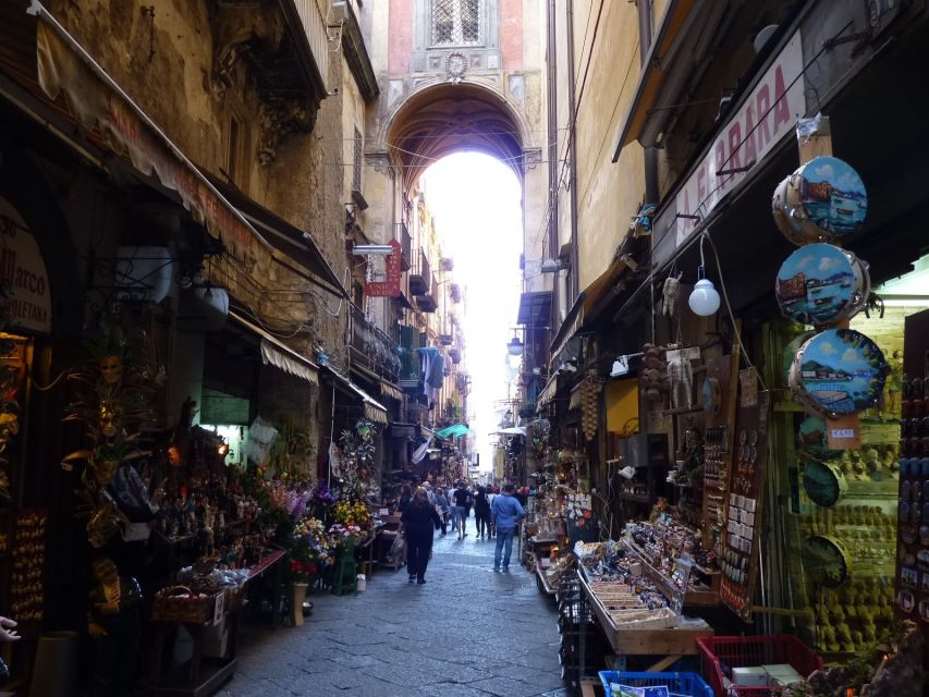 Naples: City Walking Tour w/ Underground Roman Ruins Ticket - The Spaccanapoli to Toledo connection: palaces, shops, and planning your next hours