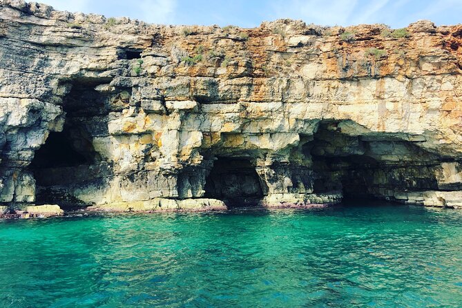 Polignano a Mare boat tour emotions, caves, diving and appetizers - Grotta Piana: emerald water and unspoiled-feeling coastline