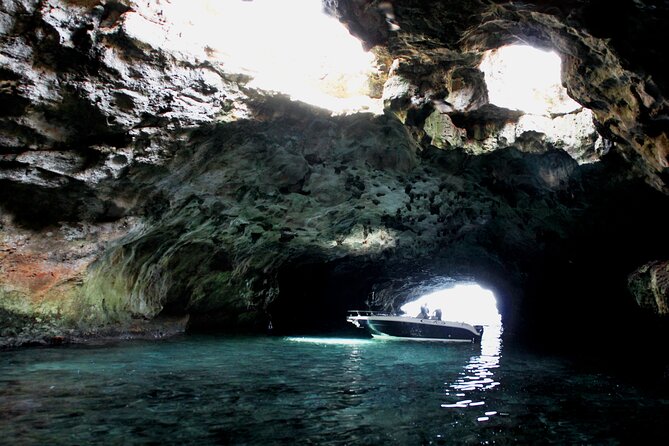 Polignano a Mare boat tour emotions, caves, diving and appetizers - Lama Monachile aperitivo: a toast with the best backdrop