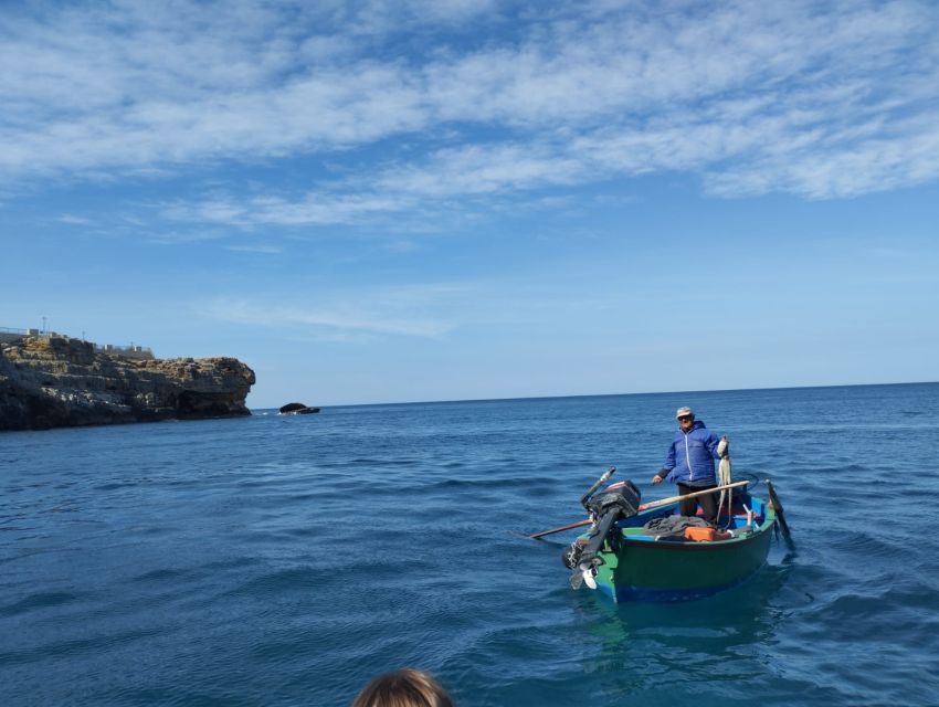 Polignano a Mare: Speedboat Cruise to Caves with Aperitif - Aperitif on board: Italian wine, snacks, and a fun skipper vibe