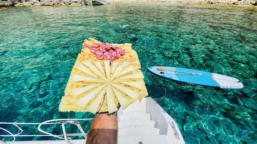 Porto Conte: Half-day catamaran tour with aperitif - The aperitif on board is simple, local, and actually useful
